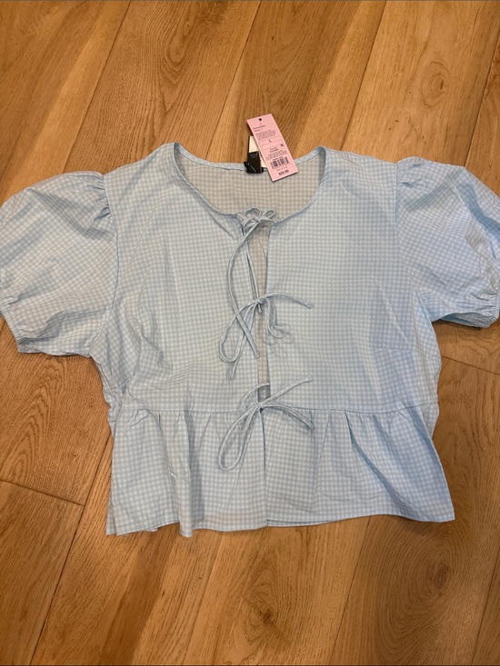 wild fable Tops - wild fable Light Blue Gingham Tie-Front Peplum Blouse